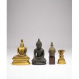 A SRI LANKAN BRONZE HEAD OF BUDDHA AND THREE SEATED FIGURES18TH CENTURY AND LATEREach with