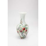 A CHINESE FAMILLE ROSE 'NINE PEACHES' VASE 20TH CENTURYTypically decorated with a fruiting tree