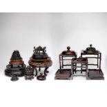 A COLLECTION OF CHINESE WOOD STANDS AND COVERS19TH AND 20TH CENTURYOf various shapes and sizes, 30cm