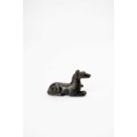 A SMALL CHINESE BRONZE GREYHOUND PAPERWEIGHTQING DYNASTYThe characterful dog lies to attention,