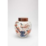 A CHINESE IMARI OVOID JAR 1ST HALF 18TH CENTURYDecorated with two phoenix, one standing on rockwork,
