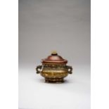 A SMALL CHINESE GOLD-SPLASHED INCENSE BURNER17TH/18TH CENTURYThe rounded rectangular body cast