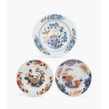 THREE CHINESE IMARI DISHES1ST HALF 18TH CENTURYOne decorated with a pair of birds beneath peony