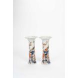 A PAIR OF CHINESE IMARI CYLINDRICAL VASES1ST HALF 18TH CENTURYDecorated with pheasants standing on