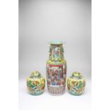 A CHINESE FAMILLE ROSE VASE AND A PAIR OF OVOID VASES AND COVERSLATE QING DYNASTYThe large vase