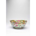 A LARGE CHINESE CANTON FAMILLE ROSE 'BUTTERFLIES' BOWL19TH CENTURYBrightly enamelled with a