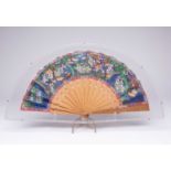 A CHINESE PAPER FAN19TH CENTURYThe paper leaf painted with figures, their faces ivory, their clothes