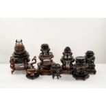 A COLLECTION OF CHINESE WOOD STANDS AND COVERS19TH AND 20TH CENTURYOf various shapes and sizes. (