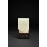 A CHINESE PALE CELADON JADE RECTANGULAR PLAQUE QING DYNASTYOne side carved in relief with