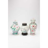 THREE CHINESE FAMILLE ROSE VASES19TH CENTURYVariously painted with flowers, foliage, birds and