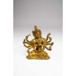 A NEPALESE GILT-BRONZE FIGURE OF USHNISHAVIJAYA17TH CENTURYThe four-headed deity seated in