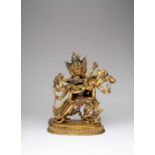 A LARGE TIBETAN GILT-BRONZE FIGURE OF CHAKRASAMVARA19TH/20TH CENTURYDepicting Chakrasamvara standing