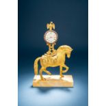 A RARE CHINESE MARKET GILDED BRONZE EQUESTRIAN TIMEPIECE QIANLONG/JIAQING C.1780-1800