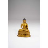 A CHINESE GILT-BRONZE SEATED FIGURE OF BUDDHA 18TH CENTURYSeated in dhyanasana upon a beaded