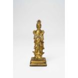 A CHINESE GILDED BRONZE FIGURE OF THE MOTHER OF THE WESTMING DYNASTY OR EARLIERThe Goddess stands