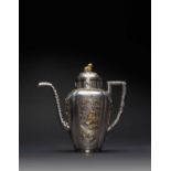A RARE CHINESE PARCEL-GILT SILVER QUATREFOIL-SECTION EWER AND COVER KANGXI 1662-1722The lobed body