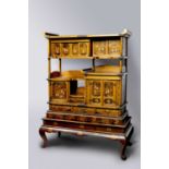 A GOOD JAPANESE TWO-PART GOLD LACQUER SHODANA (DISPLAY CABINET) MEIJI ERA, 19TH/20TH CENTURY
