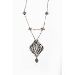An Art Nouveau silver pendant necklace, open form, cast with laurel leaf clusters, central