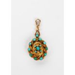 A gold and turquoise pendant the design in the manner of Dante Gabriel Rossetti, chased ropework