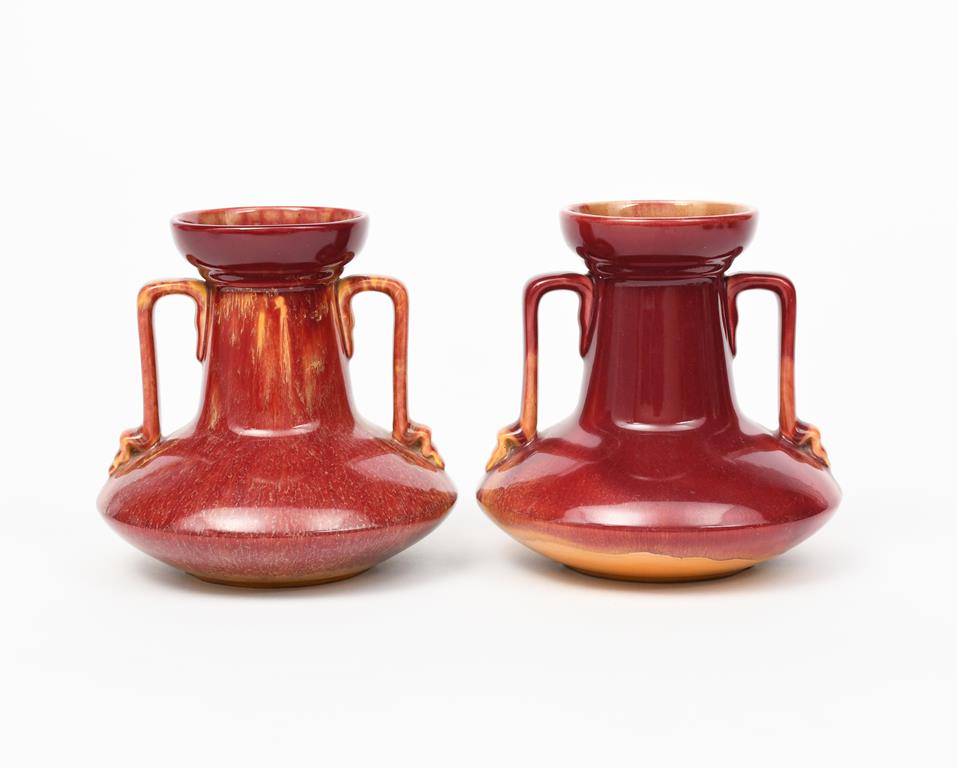 A pair of Linthorpe Pottery vases designed by Dr Christopher Dresser, model no.957, low compressed