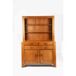 A Heal's oak dresser designed by Ambrose Heal, made as a wedding present for his son Anthony in