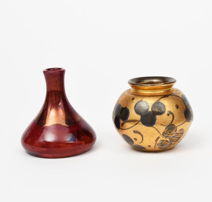 An Art Nouveau Herman Kahler Danish pottery vase, ovoid with flaring rim, painted with trefoil