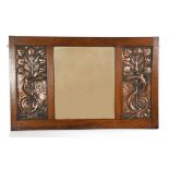 A large and impressive John Pearson oak and repousse copper wall mirror, rectangular, oak frame with