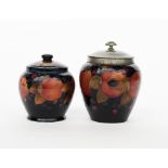 Pomegranate a Moorcroft Pottery Biscuit barrel with Tudric Pewter cover designed by William