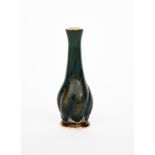 A Martin Brothers stoneware gourd vase by Edwin and Walter Martin, twisted form, covered in a