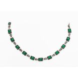A silver and green paste link necklace in the manner of Arthur & Georgie Gaskin, each rectangular