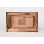 A Fivemiletown copper tray, rectangular with raised rim, engraved with rectangular panels of