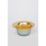 A Louis Comfort Tiffany Favrile glass bowl in presentation box, fluted form with golden iridescence,