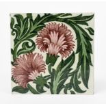 A William De Morgan Late Fulham Period tile, painted with carnations in shades of green and