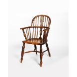 An ash and elm Windsor armchair, on turned legs, crinoline stretcher, unsigned, 92cm. high