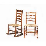 An ash and elm ladderback rocking chair, with rush seat, and an ash ladderback chair with pierced,