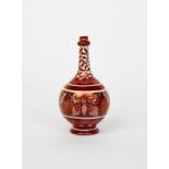 A ruby lustre solifleur vase probably William De Morgan or Maw & Co, the ovoid body painted with a