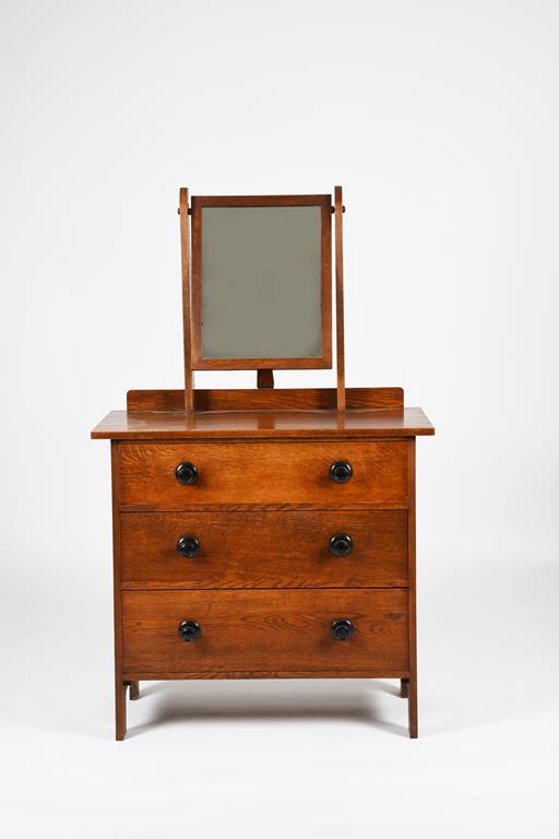 A Heal's oak John Dawson dressing chest designed by Ambrose Heal, designed 1919, rectangular with