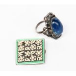 A Bernard Instone silver and enamel brooch, pierced, square section enamelled with small white