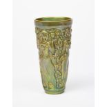 A Zsolnay Pecs pottery vase, flaring conical form, cast in low relief with a frieze of maidens,