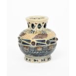 An early Martin Brothers stoneware vase by Robert Wallace Martin, ovoid with short, pierced neck,