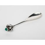 A Guild of Handicraft Ltd silver spoon designed by Charles Robert Ashbee, with openwork terminal set