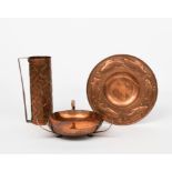 A Keswick School of Industrial Arts copper bowl, the shallow hammered bowl with three angular