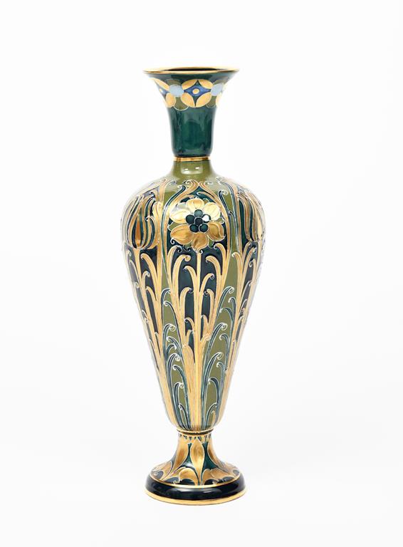 A James Macintyre Green and Gold Florian Ware vase designed by William Moorcroft, slender baluster