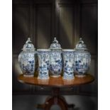 AN IMPRESSIVE GARNITURE OF FIVE LARGE DUTCH DELFT POTTERY BLUE AND WHITE VASES 19TH CENTURY