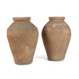 A PAIR OF ITALIAN TERRACOTTA OIL JARS VINCENZO BITOSSI, MONTELUPO, LATE 19TH / EARLY 20TH CENTURY of