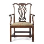 AN EARLY GEORGE III MAHOGANY OPEN ARMCHAIRCHIPPENDALE PERIOD, C.1760-65 with an interlaced pierced