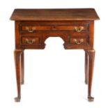 A GEORGE II OAK LOWBOY C.1750-60 with three mahogany banded drawers 78cm high, 79.5cm wide, 57.2cm