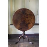 A GEORGE II MAHOGANY TRIPOD TABLE MID-18TH CENTURY the circular tilt-top above a turned stem with