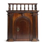 A GEORGE III MAHOGANY ARCHITECTURAL CABINET C.1780 with a balustrade gallery above an arched door
