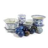 THREE CHINESE BLUE AND WHITE JARDINIÈRES19TH CENTURY AND LATER one of hexagonal form with a stand,